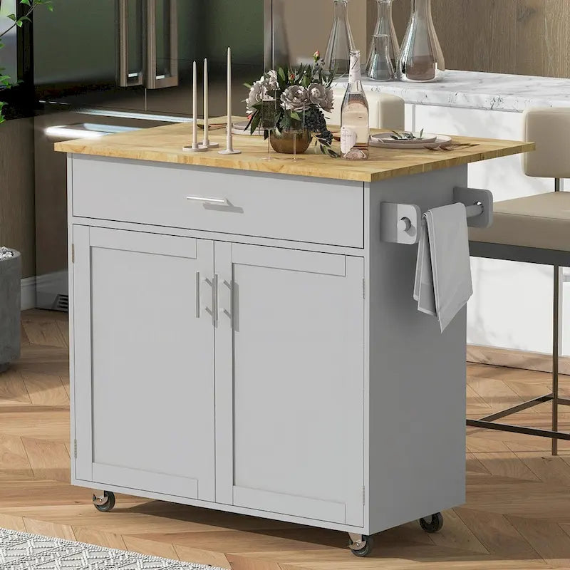 Isla de cocina con encimera de madera de caucho, cajón espacioso, estante de almacenamiento interno y ruedas